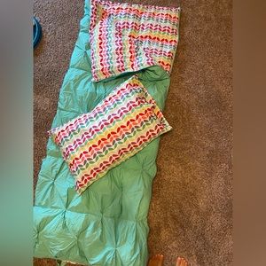Pottery barn teen sleeping bag with matching pillow case.